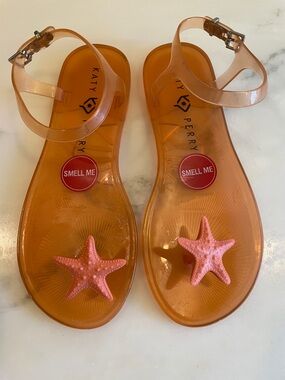 Katy Perry Orange Geli Sandals with a starfish ornament, Size 6